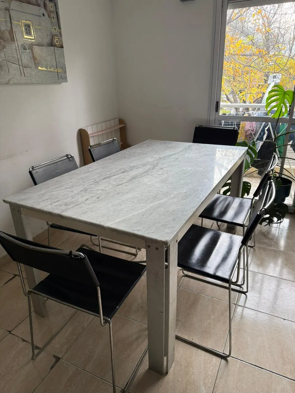 Juego de comedor: mesa + 8 sillas cuero negro cromadas