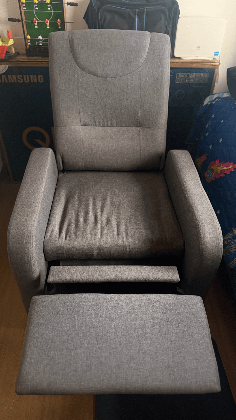 Sillón reclinable de tela gris